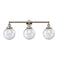 Beacon Bath Vanity Light shown in the Polished Nickel finish with a Seedy shade