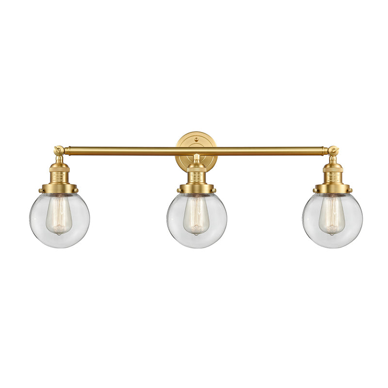 Beacon Bath Vanity Light shown in the Satin Gold finish with a Clear shade