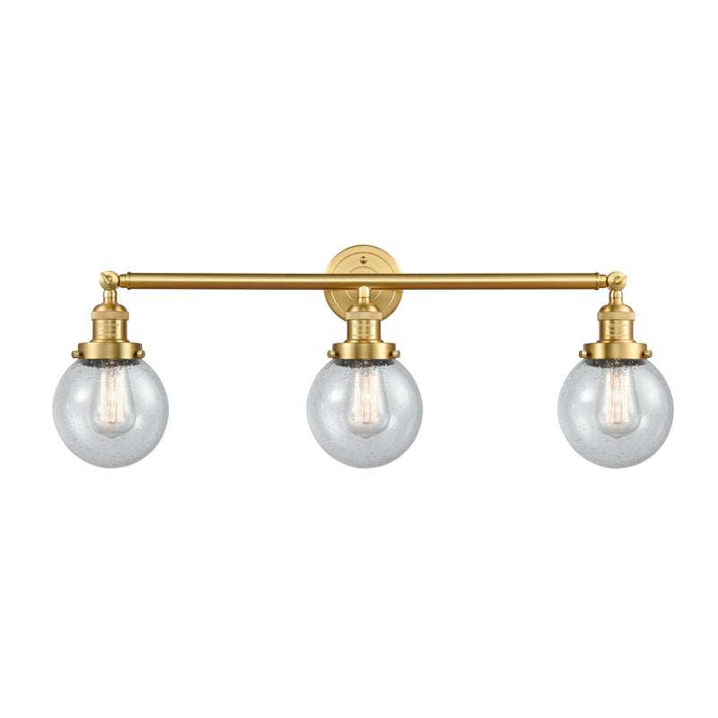 Beacon Bath Vanity Light shown in the Satin Gold finish with a Seedy shade