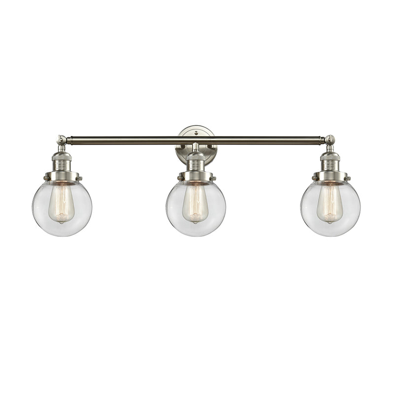 Beacon Bath Vanity Light shown in the Brushed Satin Nickel finish with a Clear shade