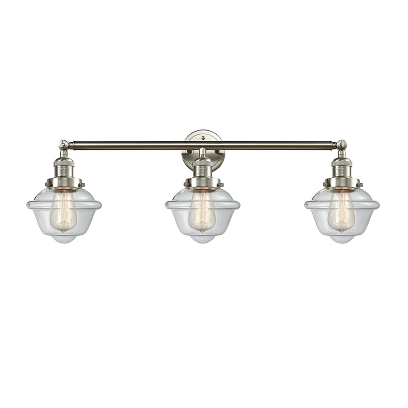 Oxford Bath Vanity Light shown in the Brushed Satin Nickel finish with a Clear shade