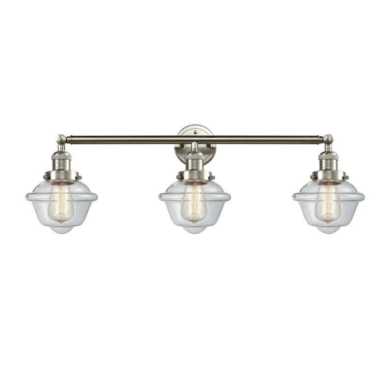 Oxford Bath Vanity Light shown in the Brushed Satin Nickel finish with a Clear shade