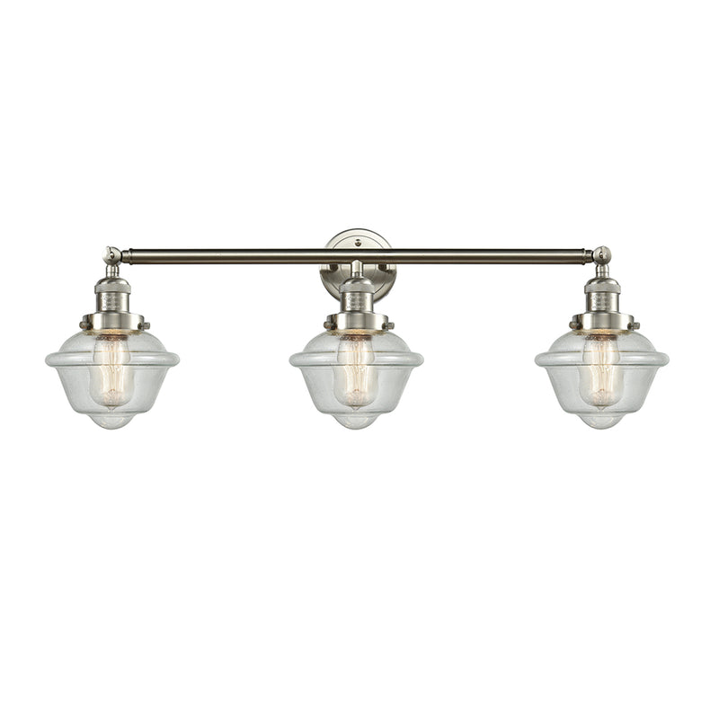 Oxford Bath Vanity Light shown in the Brushed Satin Nickel finish with a Seedy shade