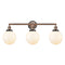 Beacon Bath Vanity Light shown in the Antique Copper finish with a Matte White shade