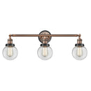 Beacon Bath Vanity Light shown in the Antique Copper finish with a Clear shade