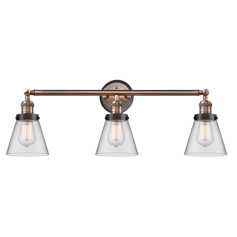 Cone Bath Vanity Light shown in the Antique Copper finish with a Clear shade