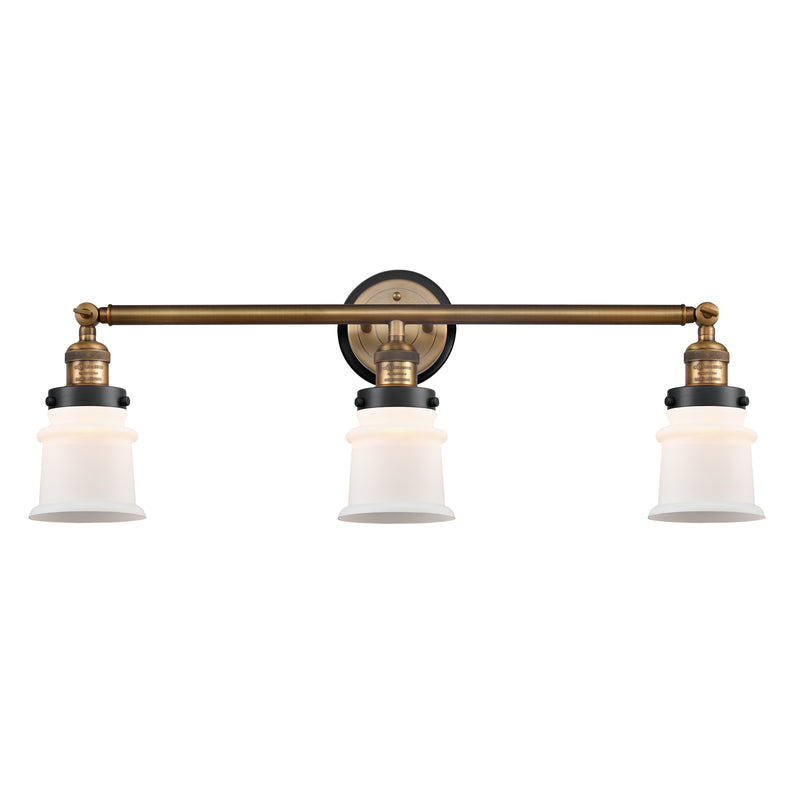 Canton Bath Vanity Light shown in the Brushed Brass finish with a Matte White shade