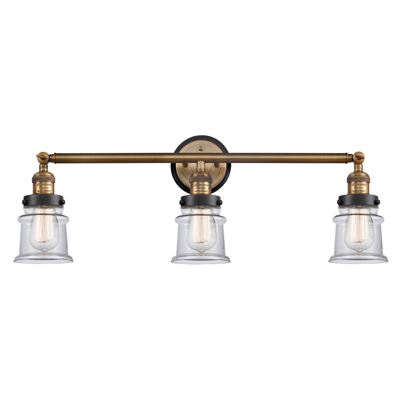 Canton Bath Vanity Light shown in the Brushed Brass finish with a Clear shade