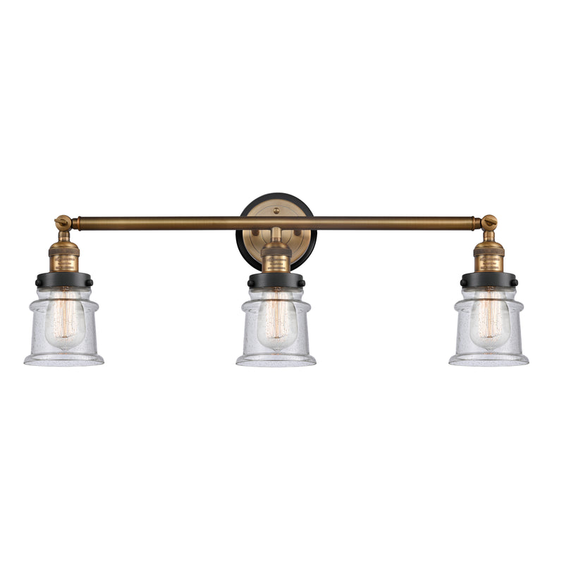 Canton Bath Vanity Light shown in the Brushed Brass finish with a Seedy shade