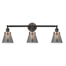 Cone Bath Vanity Light shown in the Matte Black finish with a Plated Smoke shade