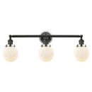 Beacon Bath Vanity Light shown in the Matte Black finish with a Matte White shade