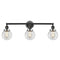 Beacon Bath Vanity Light shown in the Matte Black finish with a Clear shade