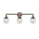 Beacon Bath Vanity Light shown in the Antique Copper finish with a Clear shade