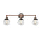 Beacon Bath Vanity Light shown in the Antique Copper finish with a Clear shade