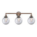 Beacon Bath Vanity Light shown in the Antique Copper finish with a Clear shade