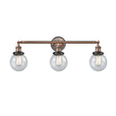 Beacon Bath Vanity Light shown in the Antique Copper finish with a Seedy shade