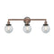 Beacon Bath Vanity Light shown in the Antique Copper finish with a Seedy shade