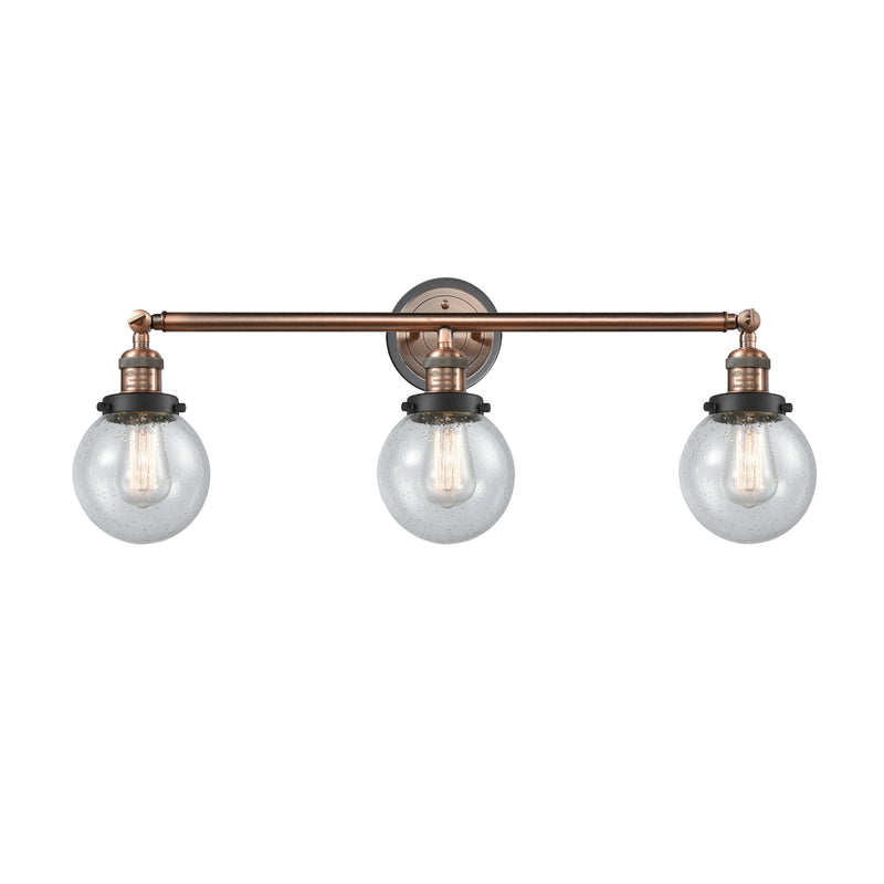 Beacon Bath Vanity Light shown in the Antique Copper finish with a Seedy shade