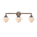 Oxford Bath Vanity Light shown in the Antique Copper finish with a Matte White shade