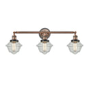 Oxford Bath Vanity Light shown in the Antique Copper finish with a Seedy shade