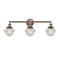 Oxford Bath Vanity Light shown in the Antique Copper finish with a Seedy shade