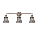 Cone Bath Vanity Light shown in the Antique Copper finish with a Plated Smoke shade