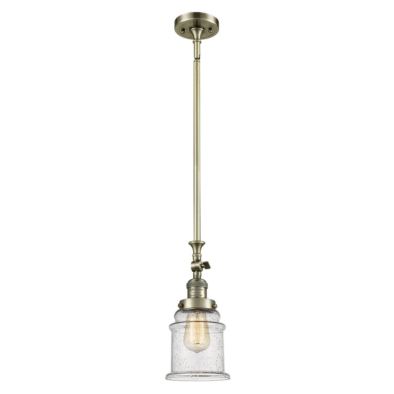 Canton Mini Pendant shown in the Antique Brass finish with a Seedy shade