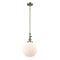 Beacon Mini Pendant shown in the Antique Brass finish with a Matte White shade