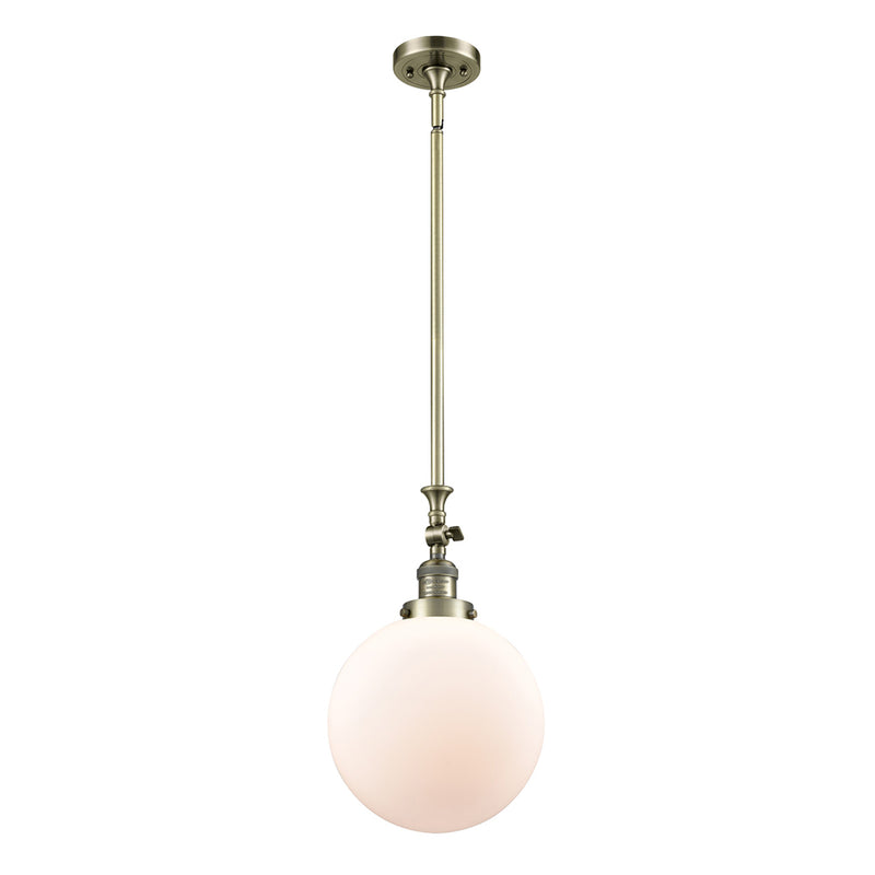 Beacon Mini Pendant shown in the Antique Brass finish with a Matte White shade