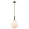 Beacon Mini Pendant shown in the Antique Brass finish with a Matte White shade