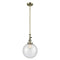 Beacon Mini Pendant shown in the Antique Brass finish with a Seedy shade