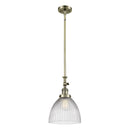 Seneca Falls Mini Pendant shown in the Antique Brass finish with a Clear Halophane shade