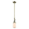 Dover Mini Pendant shown in the Antique Brass finish with a Matte White shade