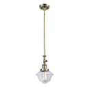 Oxford Mini Pendant shown in the Antique Brass finish with a Clear shade