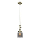 Bell Mini Pendant shown in the Antique Brass finish with a Plated Smoke shade