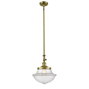 Oxford Mini Pendant shown in the Antique Brass finish with a Clear shade