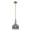 Bell Mini Pendant shown in the Antique Brass finish with a Plated Smoke shade