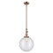 Beacon Mini Pendant shown in the Antique Copper finish with a Clear shade