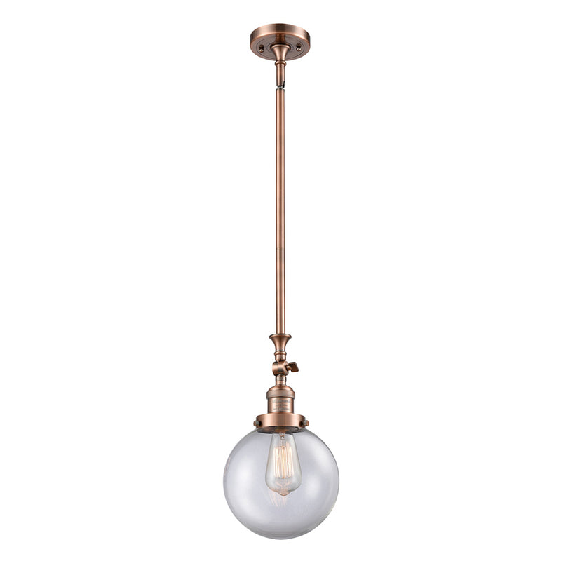 Beacon Mini Pendant shown in the Antique Copper finish with a Clear shade