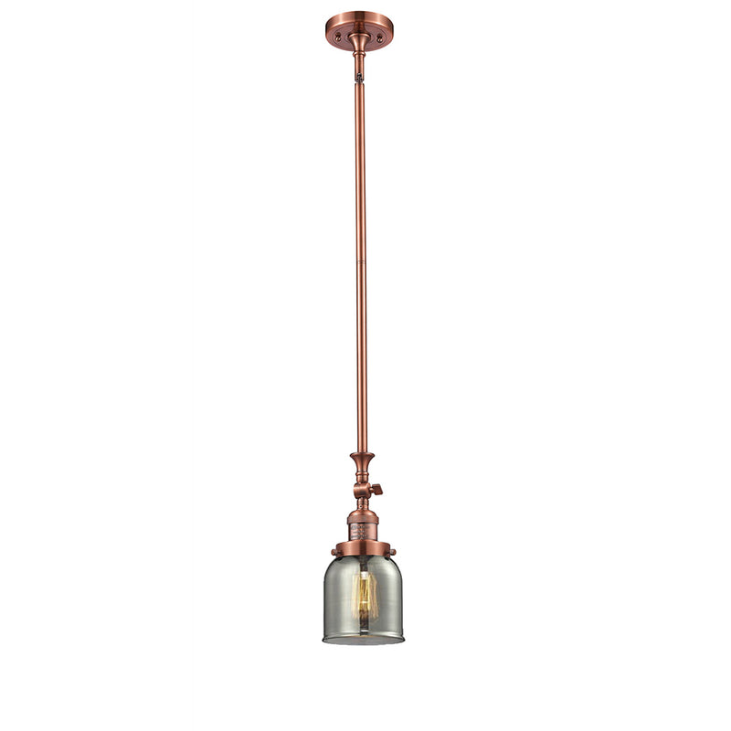 Bell Mini Pendant shown in the Antique Copper finish with a Plated Smoke shade