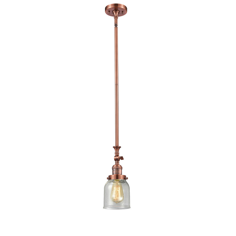 Bell Mini Pendant shown in the Antique Copper finish with a Seedy shade