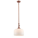 Bell Mini Pendant shown in the Antique Copper finish with a Matte White shade