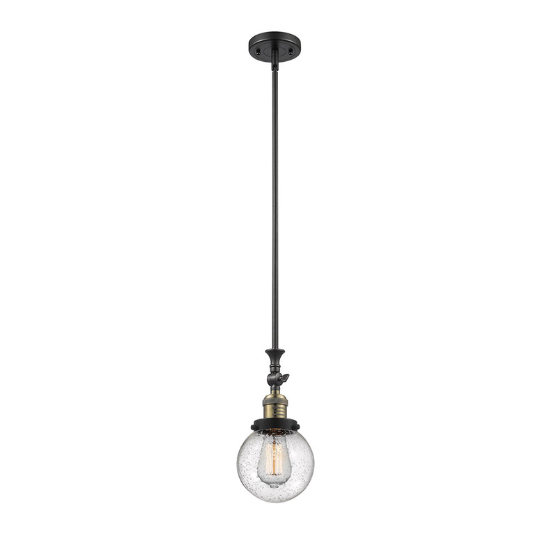 Beacon Mini Pendant shown in the Black Antique Brass finish with a Seedy shade