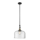 Bell Mini Pendant shown in the Black Antique Brass finish with a Clear shade