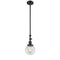 Beacon Mini Pendant shown in the Matte Black finish with a Clear shade