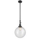 Beacon Mini Pendant shown in the Matte Black finish with a Seedy shade