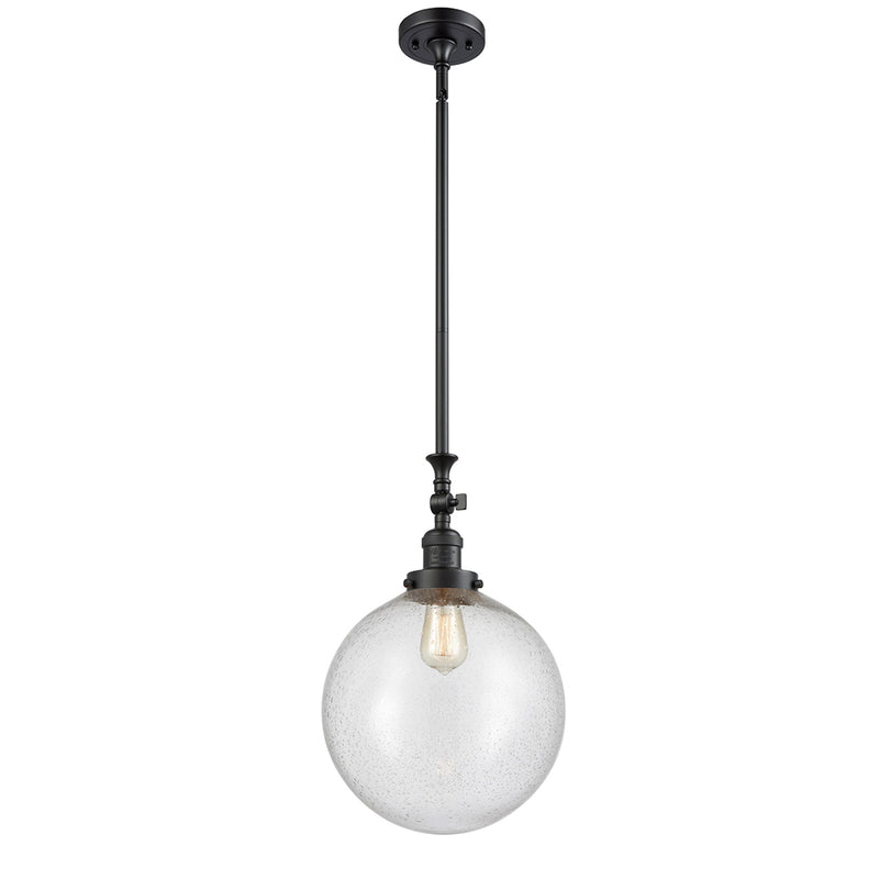 Beacon Mini Pendant shown in the Matte Black finish with a Seedy shade