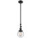 Beacon Mini Pendant shown in the Matte Black finish with a Seedy shade