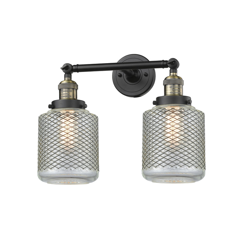 Stanton Bath Vanity Light shown in the Black Antique Brass finish with a Clear Wire Mesh shade