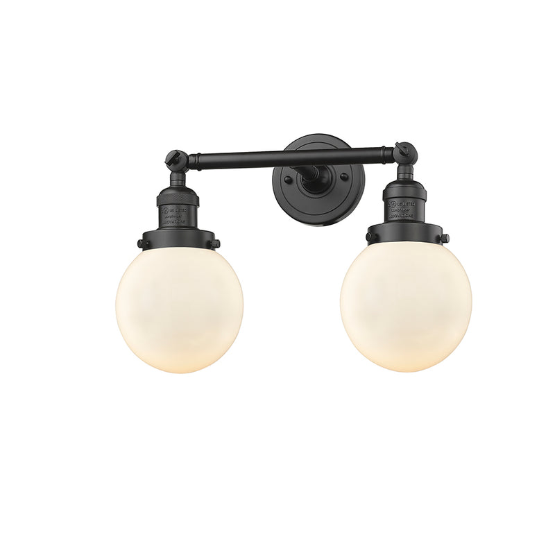 Beacon Bath Vanity Light shown in the Oil Rubbed Bronze finish with a Matte White shade